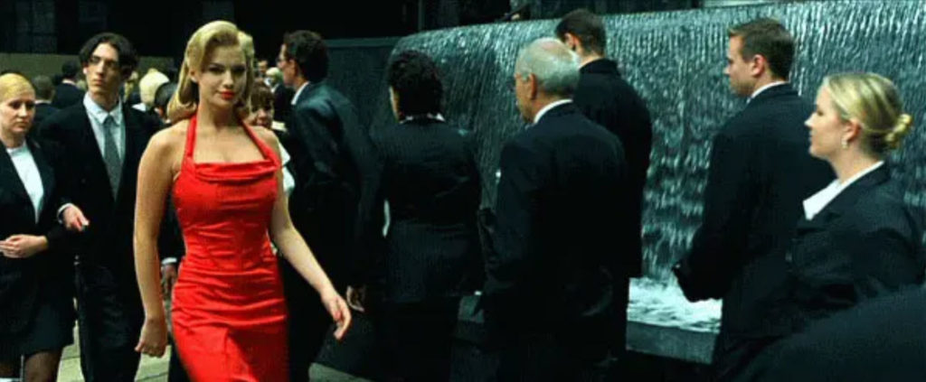 Woman in the red dress.