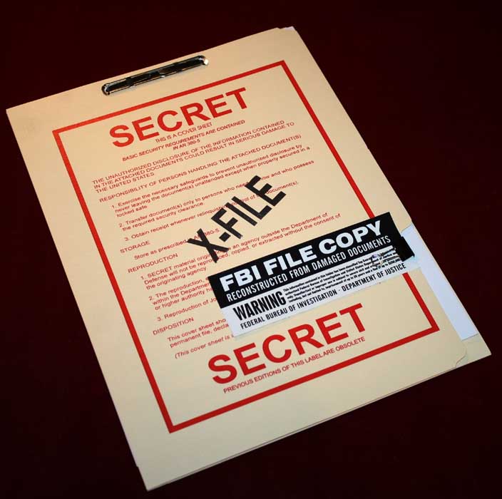 Here is a folder from the television show the X-Files. It is not at all how real secrets are handled. MAJestic and MJ-12 and all SAP programs never use such props. Top Secret Folder from the Television show the X-files