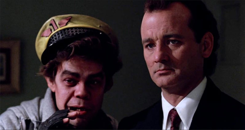 A ghost has Bill Murry confront his life, his past, present and future. Scene from the movie "Schrooged".