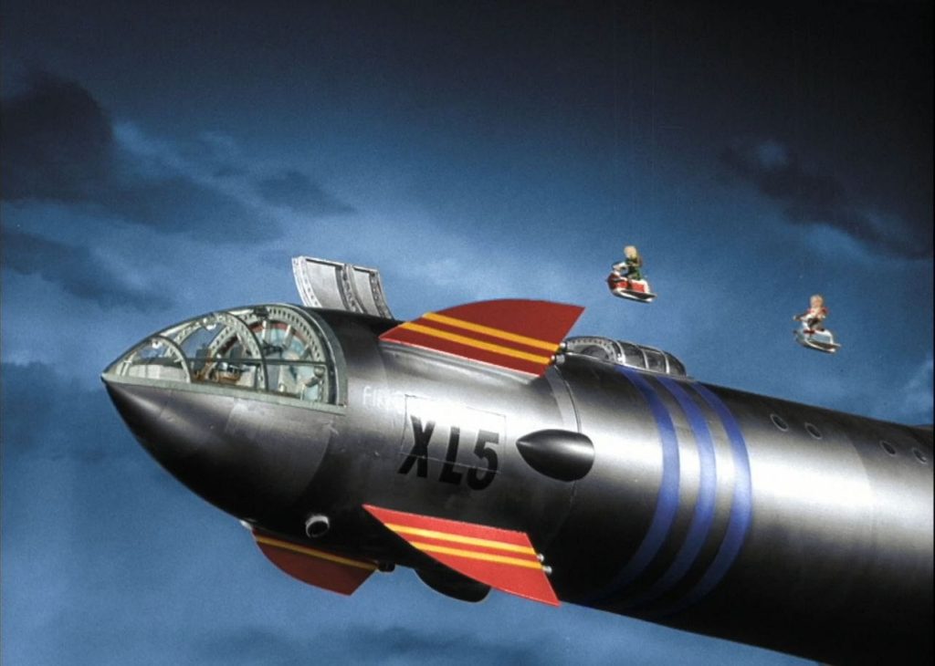 By watching the television shows we could live the exploration of space in our own imaginations. space ship and rocket Fireball XL-5