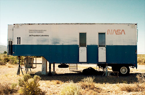 No one ever writes about the colossal waste of manpower, resources and effort that went into the decision to change NASA from a manned exploration focus to one of robotic earth observation. NASA trailer