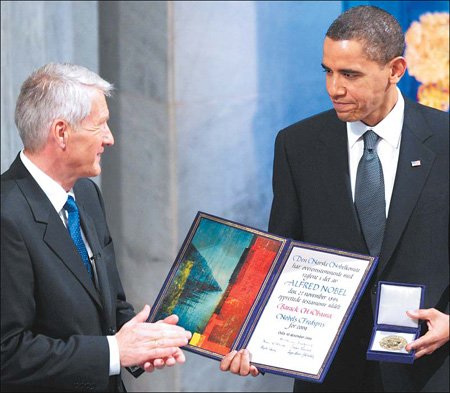 Obama getting a Nobel Peace Prize for being a socialist negro globalist. Obama with award.