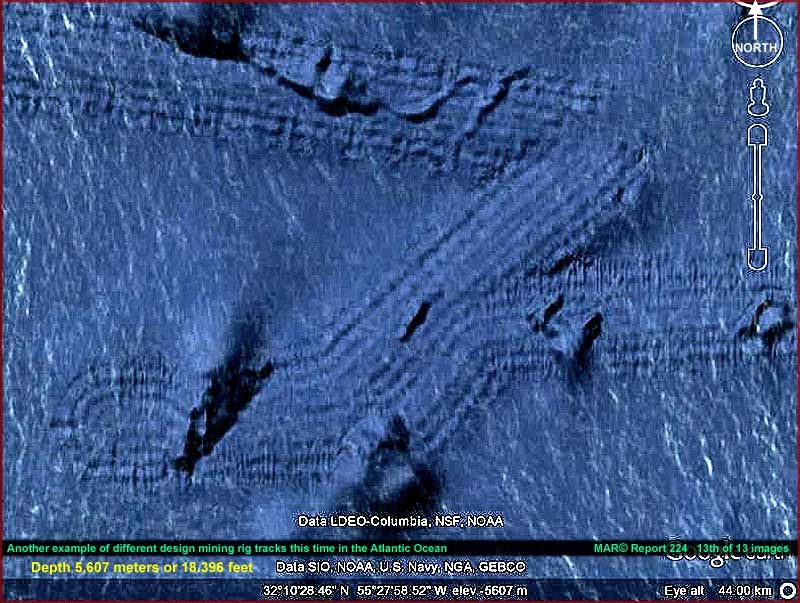 The track behavior is suggestive of mining efforts of one type rather than natural large-scale geologic processes.