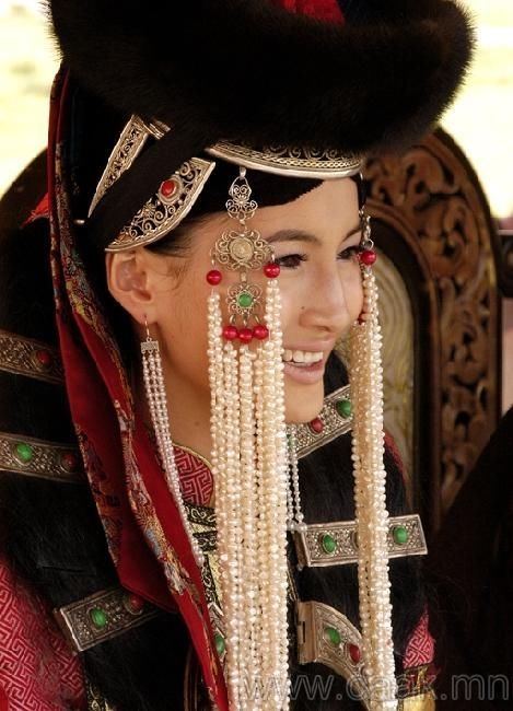 A portrait of a very beautiful Mongolian woman. Her husband would be a very, very lucky man, I'll tell you what.