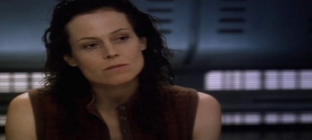 Ripley 8 from the movie "Alien Resurrection". She is a hybrid of Alien DNA and human DNA, with unexpected strengths and abilities.